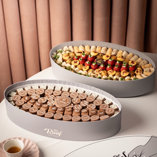 The Roof Boxes Offers 11 - عرض بوكسات ذا روف بتصميم خاص عبارة عن ١٢٥ قطعة كاكاو بحشوات مختلفة ويفر بالبستاشيو ، كرانشي كاكاو برلين ، كرمل بسكويت ،بستاشيو كاكاو مع بوكس موالح سبيشل ٧٨ قطعه عبارة عن تورتيلا بخلطة البطاط، توست بخلطة الاجبان ، تورتيلا جبن مكس ، كبة الشمندر، كبة سمسم بجبن الكيري، كبة بالجبن