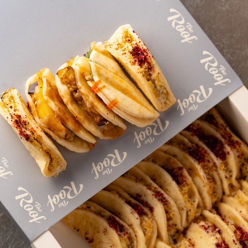 Box of walnuts and phyllo pastry with saj tacos