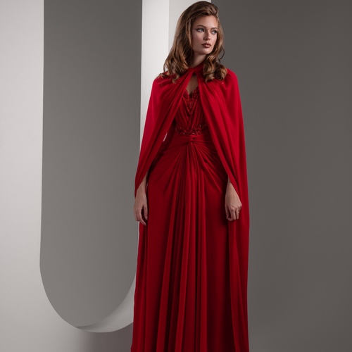 rad shefon marina - A luxurious dress paired with an original French chiffon shawl, adorned with exquisite beading and red crystals. The dress features a pure Siak original lining, adding an extra touch of elegance and comfort to the ensemble.