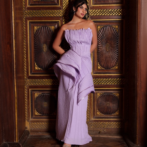 mouve new 2025 - A unique mauve dress crafted from a new type of fabric, featuring harmonious pleats and special signature pleats by us. Designed with varied cuts for an elegant and distinguished look.