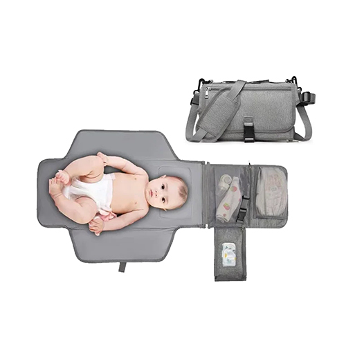 Diaper Changing Bag - Foldable Cotton material with good ventilation Used as a blanket Includes a head pillow and a strap for easy carrying Water resistant Ages from 0 to 36 months