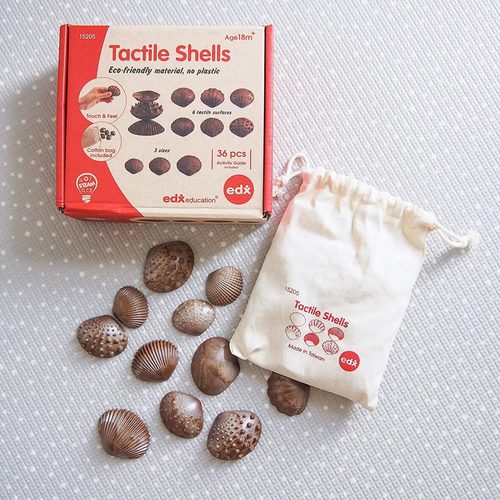 Moolly Store  - Tactiles Shells - These special designed sea shells are made from 100% Fibre Particulate Composite (FPC) agricultural waste. Tactile Shells have 6 different tactile surfaces and come in 3 sizes, offering youngsters sensory experiences. Children can use three of their five senses (sight, sound and touch) to explore these shells and engage in sensory play. Suitable from 18 months