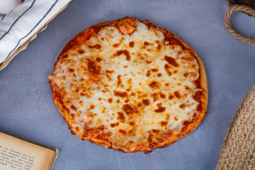 Margherita Pizza - Made with fresh mozzarella, tomatoes and basil, it's a simple and delicious recipe that never disappoints.