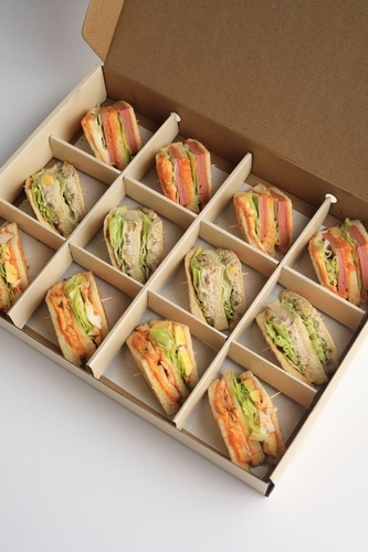 Mini Club Sandwich Box - 12 pcs - An assortment of 12 mini club sandwiches of your choice—perfect for gatherings and sharing