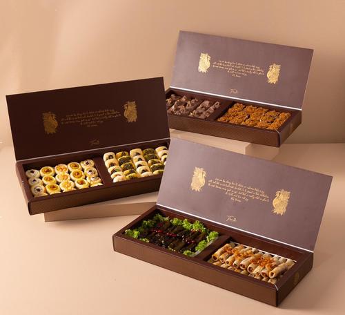 Offer of 3 brown peacock rocky road boxes with crunchy, fatayer, grape leaves and musakhan