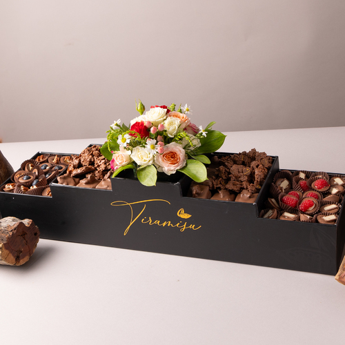 Royal Black Mudarj Chocolate - The new royal contains   80 pieces of mix of luxurious Belgian chocolate with petit four caramel and ghariba with elegant flower arrangements