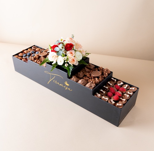 Royal Black Mudarj Chocolate - The new royal contains   80 pieces of mix of luxurious Belgian chocolate with petit four caramel and ghariba with elegant flower arrangements