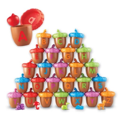 Alphabet Acorns Activity Set - EARLY LITERACY DEVELOPMENT - Engage children in multi-sensory alphabet learning with adorable acorns featuring uppercase letters on tops, lowercase letters toys that reinforce letter sounds. FINE MOTOR SKILL BUILDING - Strengthen little hands as children twist open acorns, manipulate small objects, and snap caps back on, developing the crucial dexterity needed for writing and other tasks. MULTIPLE LEARNING OPPORTUNITIES - Create various educational games from letter matching and alphabetical ordering to word building and color sorting, keeping children engaged while learning essential skills. SURPRISE AND DELIGHT FACTOR - Watch children's excitement as they discover the hidden toy inside each acorn that corresponds to its letter, making alphabet practice a rewarding treasure hunt experience. DURABLE CLASSROOM-QUALITY DESIGN - Made from thick, sturdy plastic that withstands enthusiastic play from multiple children, with 78 total pieces including 26 two-piece acorns and 26 matching .