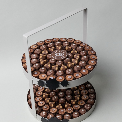 chocolate stand - A two-tiered steel tray containing approximately 1,200 grams of chocolate.