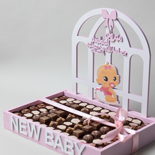 New baby pink - A baby box containing approximately 500 grams of chocolate with different fillings