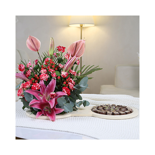 Jasper 1 - Height: 35cm
Width: 70cm
A tray that contains mixed anthurium and lily flowers and Belgium chocolates.