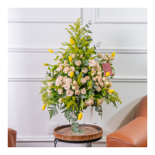 Lucene - The Hub - Height: 70cm
Width: 25cm
This vase contains solidago, tulips and baby roses.