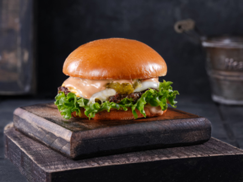 Montana Chicken Single - Burger Bun, Chcken ,Montana Sauce , Cheese Mmozrealla & Cheese Chider & Cheese Emmnatal & Sweet Relaish