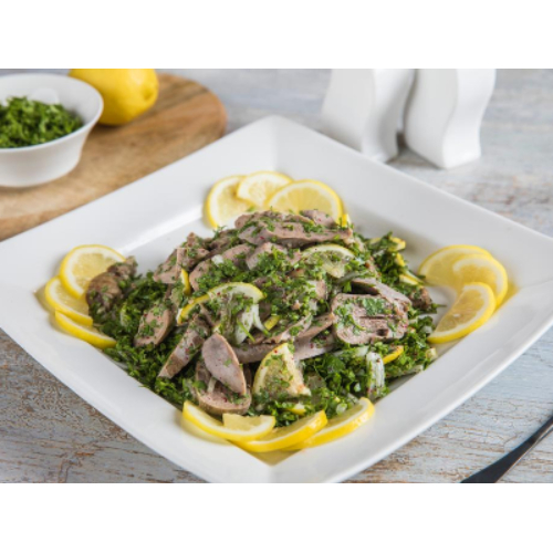 Lamb Tongues Salad - Pieces of prepared lamb tongue with parsley and lemon