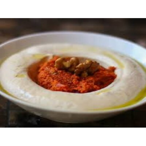 Hummus Basha - Chickpea tahini mixture served with Muhammara