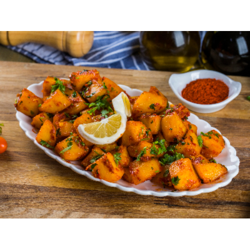 Spicy Potato - Fried potato cubes with coriander, chili flakes and garlic,.