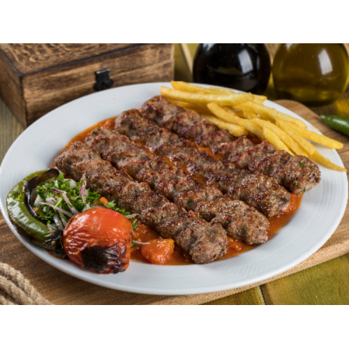 Kebab Kheshkhash - Lamb kebab with special tomato sauce.