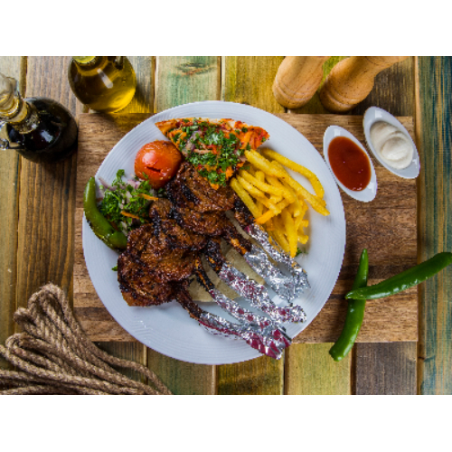 Lamb Chops - Marinated, charcoal grilled, lamb chops, served with french fries