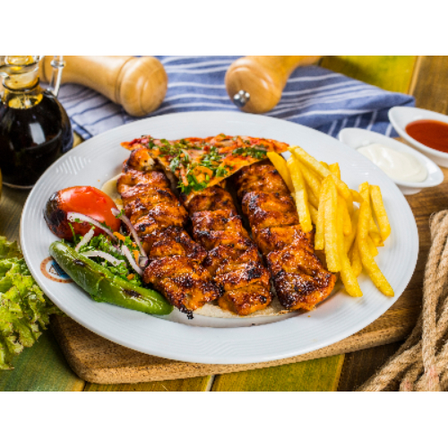 Shish Tawook - Marinated chicken cubes, served with french fries.