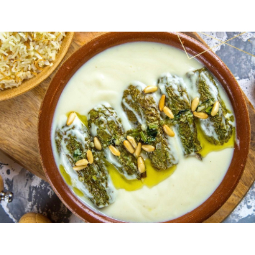 Zucchini With Milk Sheikh Al Mahshi - Fresh zucchini stuffed with meat and nuts and cooked with milk