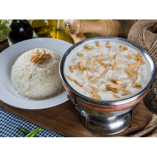 Chicken Shakriyah - Pieces of chicken breast cooked in milk served with rice