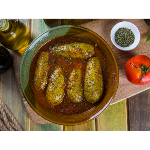 Zucchini With Rice and Meat - Fresh zucchini stuffed with meat and rice