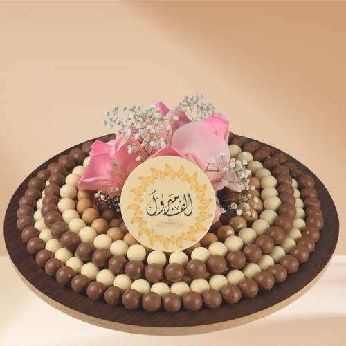 Chocolate balls tray with fresh flowers