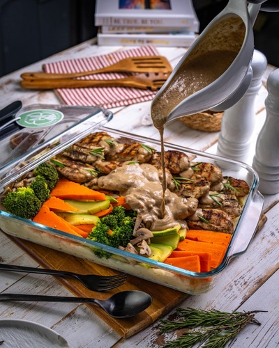 Healthy Dish - Savor the deliciousness of our perfectly grilled chicken, served alongside a medley of fresh,  vegetables. This dish is complemented by a side of creamy mashed potatoes and a rich, flavorful mushroom sauce, creating a delightful and satisfying meal.