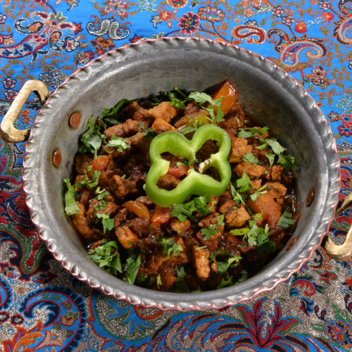 Meat Hamees - Small fresh meat cooked with tomato, onion, lemon, pomegranate molasses and paprika.