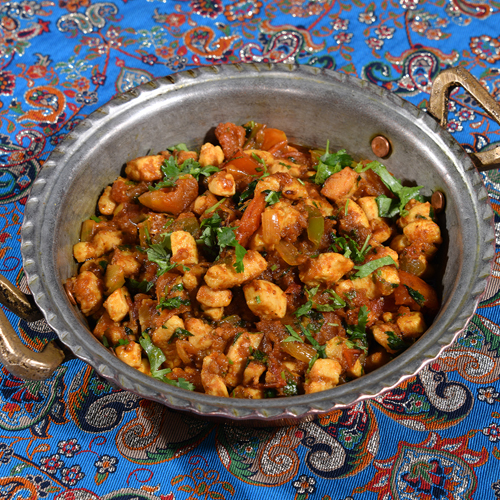 Chicken Hamees - Small fresh chicken without bone cooked with tomato, onion, lemon, pomegranate molasses and paprika.