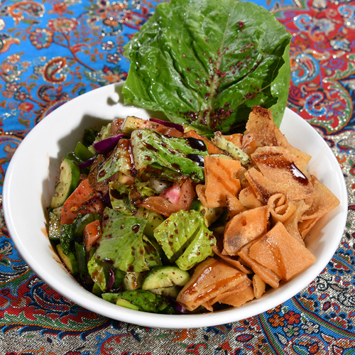 Fattoush - Tomato, cucumber, lettuce, parsley, toast, sumac, olive oil and lemon.