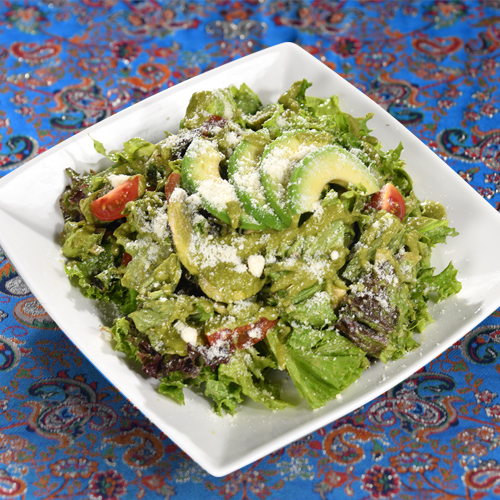 Yas Salad - Lolo rossso with iceberg lettuce , cherry tomatoes
  , mushrooms, avocado , parmesan cheese and pesto sauce