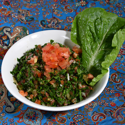 Tabbouleh - Parsley, tomato, white onion, groats, olive oil and lemon.