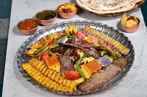 Yas Tray 4 Persons - 2 chicken Kebab, 2 iranian kebab, 1 Barg Kabab, 4 ribs, Kebab Jojh, Saffron Rice, Okra Stew and sabzi stew