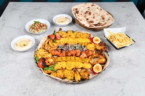 Makhsus protein chicken tray ( 6 to 7 persons) - 5Shishlak chicken, 3chicken kebab, 2 joojeh kebab, 2 tawook, whole  chicken, Shirazi salad, 2 hummus,fries, with Yas service and tandoor bread