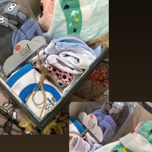 Newly born - A boy's set containing a blanket, shoes, tights, and a hat