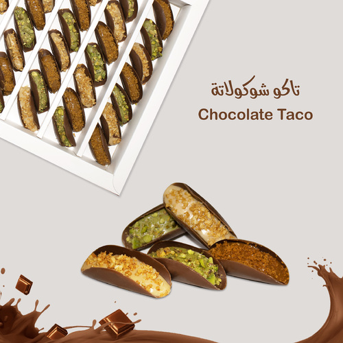 Chocolate Taco - 54 taco pieces stuffed with kinder khashwa, with lotus filling, pistachio filling and luxurious Belgian chocolate.