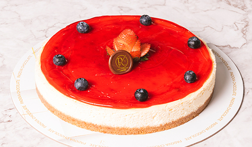 Padova Chocolate - STRAWBERRY CHEESECAKE - A mixture of fresh cream cheese, astroberry sauce and a biscuit layer