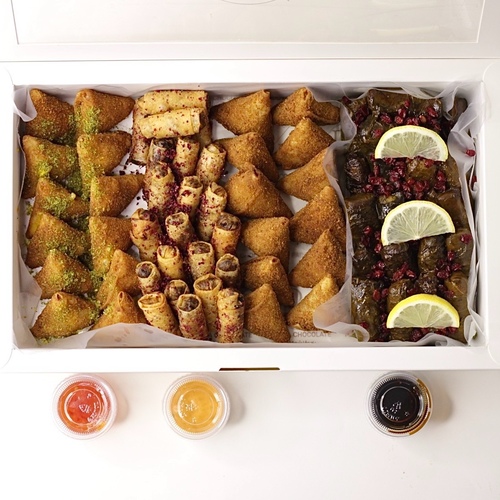 large mix mawaleh - 20 grape leaves - 20 musakhan - 10 cheese samosa - 10 potato samosa