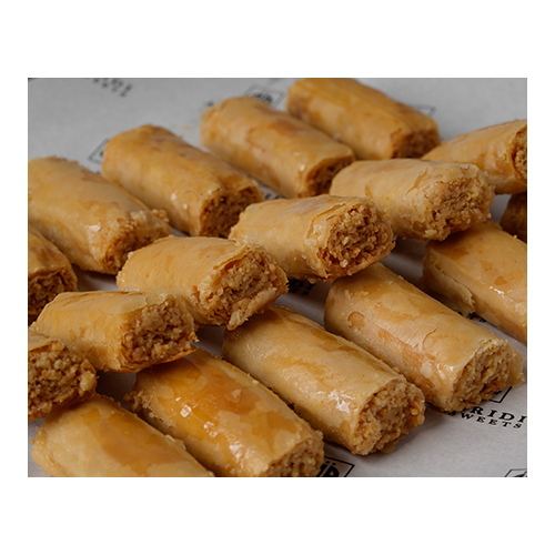 Baklawa Fingers Cashew - Prepared from crisp dough sheets, stuffed with cashew nuts and sweetened with syrup.