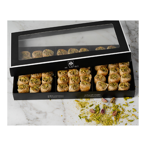 Baklawa Koul W Shkour Pistachio - Prepared from crisp dough sheets, stuffed with pistachio and sweetened with syrup.