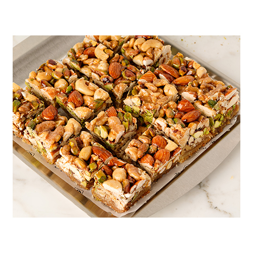 Mlookiye - Prepared from kunafa dough and Mixed nuts, sweetened with syrup