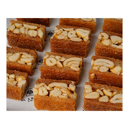 Baloreye Cashew - Made of fine vermicelli stuffed with cashew nuts, sweetened with syrup