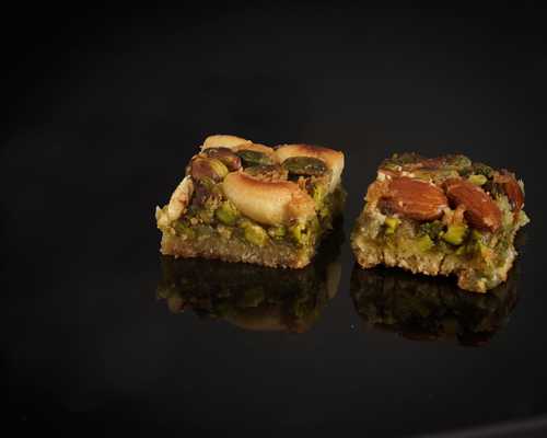 Basma Mix Nuts - Prepared from kunafa dough and Mixed whole nuts, sweetened with syrup