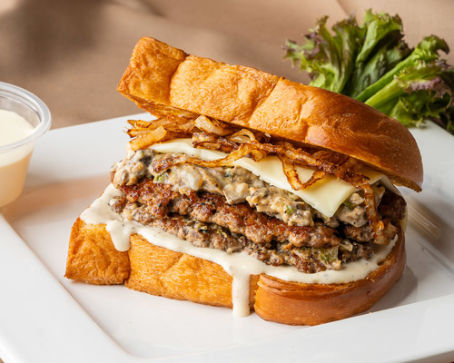 Mushroom Burger - 2 pieces of fresh beef , mushroom, caramelized onion and our delicious mushroom sauce