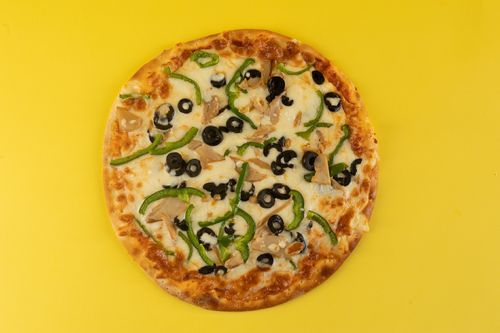 Vegetable Pizza - Pizza sauce, green pepper, black olives and mushroom with mozzarella cheese.