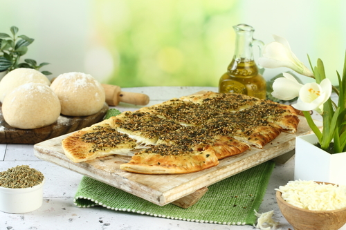 Mah'shiah zaatar with cheese - Lebanese dough stuffed with cheese covered with zaatar (thyme)