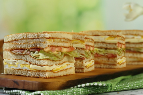 Cheese Club Sandwich - Mozzarella
  Cheese - Kraft Cheese - Cheddar cheese - lettuce mayonnaise - Tomato -
  Egg