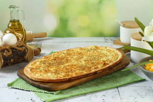 Egg With cheese mushtah - The light lebanese mushtah open dough With egg and cheese and some oregano