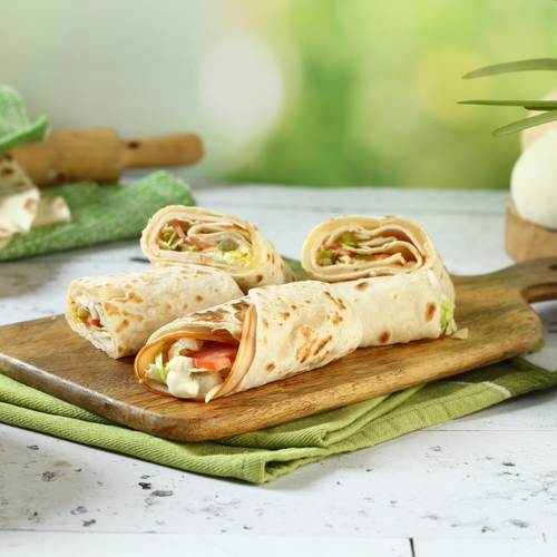 Turkey with cheese - Turkey served with kashkawan cheese, lettuce, tomato , pickles, mayonnaise and mustard.